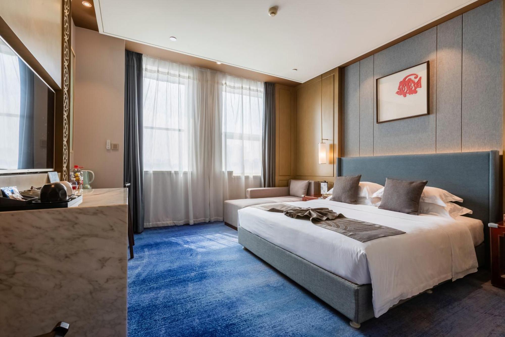 Bliss International Hotel Weihai Exterior foto